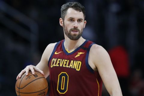 Cleveland Cavaliers forward Kevin Love controls the ball during the first half of an NBA basketball game, Monday, Jan. 27, 2020, in Detroit. (AP Photo/Carlos Osorio)