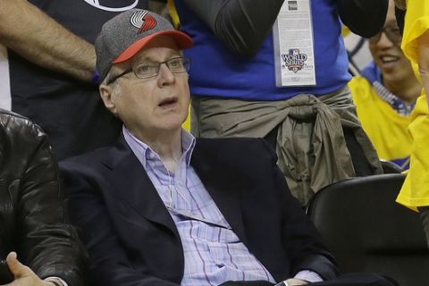 Portland Trail Blazers owner Paul Allen watches during the second half of Game 1 of a first-round NBA basketball playoff series between the Golden State Warriors and the Trail Blazers in Oakland, Calif., Sunday, April 16, 2017. The Warriors won 121-109. (AP Photo/Jeff Chiu)