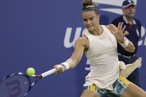 Maria Sakkari, of Greece, hits a forehand to Sofia Kenin, of the United States, during the second round of the U.S. Open tennis tournament Wednesday, Aug. 29, 2018, in New York. (AP Photo/Jason DeCrow)
