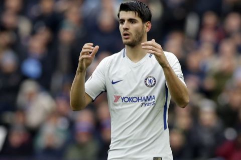 Chelsea's Alvaro Morata reacts after failing to score during the English Premier League soccer match between West Ham United and Chelsea at the London stadium in London, Saturday, Dec. 9, 2017. (AP Photo/Alastair Grant)