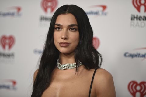 Dua Lipa arrives at iHeartRadio Jingle Ball on Friday, Dec. 2, 2022, at the Kia Forum in Los Angeles. (Photo by Richard Shootwell/Invision/AP)