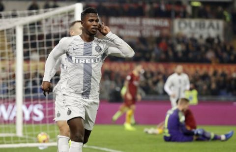 Inter Milan's Keita Balde celebrates after scoring his side's opening goal during the Serie A soccer match between Roma and Inter Milan at the Rome Olympic stadium, Sunday, Dec. 2, 2018. (AP Photo/Andrew Medichini)