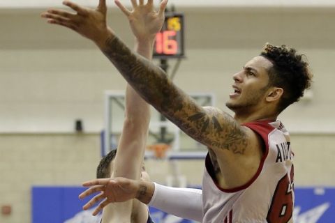 Miami Heat's Zach Auguste, right, and Indiana Pacers' T.J. Leaf go after a rebound during the second half of an NBA summer league basketball game, Monday, July 3, 2017, in Orlando, Fla. (AP Photo/John Raoux)