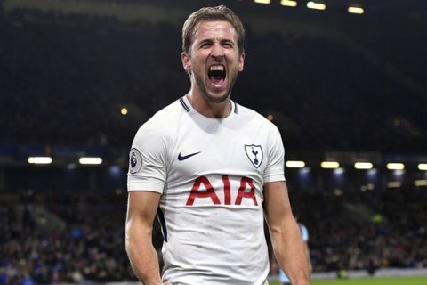Tottenham Hotspur's Harry Kane celebrates scoring his side's third goal of the game during their English Premier League soccer match against Burnley at Turf Moor, Burnley, England, Saturday, Dec. 23, 2017. (Anthony Devlin/PA via AP)
