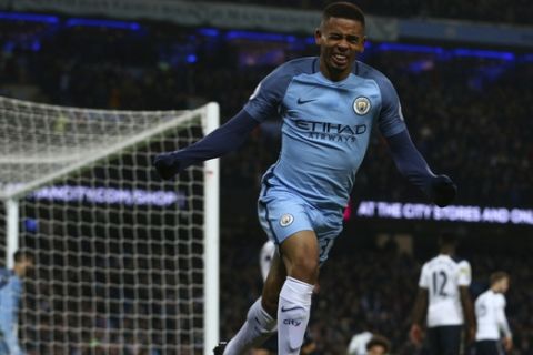 Manchester City's Gabriel Jesus celebrates after he thought he had scored a goal -only for it to be ruled offside during the English Premier League soccer match between Manchester City and Tottenham Hotspur at the Etihad stadium in Manchester, England, Saturday, Jan. 21, 2017. The match ended in a 2-2 draw. (AP Photo/Dave Thompson)
