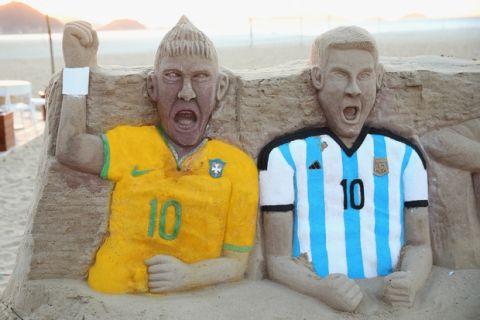 RIO DE JANEIRO, BRAZIL - JUNE 09: A sandcastle of Neymar of Brazil and Lionel Messi of Argentina on Copacabana beach on June 9, 2014 in Rio de Janeiro, Brazil.  (Photo by Julian Finney/Getty Images)