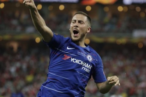 Chelsea's Eden Hazard celebrates after scoring his side's fourth goal during the Europa League Final soccer match between Arsenal and Chelsea at the Olympic stadium in Baku, Azerbaijan, Wednesday, May 29, 2019. (AP Photo/Luca Bruno)