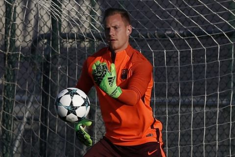 FC Barcelona's goalkeeper Marc-Andre ter Stegen attends a training session at the Sports Center FC Barcelona Joan Gamper in Sant Joan Despi, Spain, Tuesday, Oct. 17, 2017. FC Barcelona will play against Olympiacos in a Champions League Group D soccer match on Wednesday. (AP Photo/Manu Fernandez)