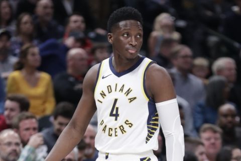 Indiana Pacers guard Victor Oladipo (4) plays against the Milwaukee Bucks during the first half of an NBA basketball game in Indianapolis, Wednesday, Dec. 12, 2018. (AP Photo/Michael Conroy)