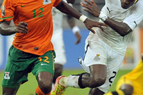 Ghana's national football team player John Boye (R) vies for the ball with Zambia's Jemes Chamanga (L) during the Africa Cup of Nations (CAN) semi-final football match between Ghana and Zambia in Bata on February 8, 2012. AFP PHOTO / ABDELHAK SENNA (Photo credit should read ABDELHAK SENNA/AFP/Getty Images)