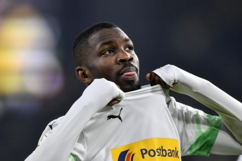 Moenchengladbach's Marcus Thuram reacts during the German soccer cup, DFB Pokal, second Round match between Borussia Dortmund and Borussia Moenchengladbach in Dortmund, Germany, Wednesday, Oct. 30, 2019. (AP Photo/Martin Meissner)