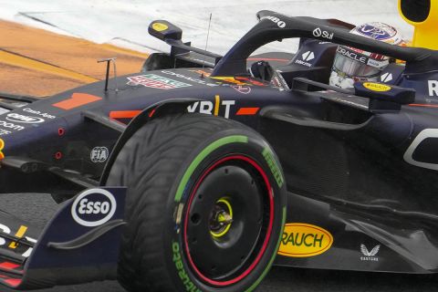Dutch Formula One driver Max Verstappen of Red Bull Racing steers his car during the qualifying session ahead of Sunday's Formula One Dutch Grand Prix auto race, at the Zandvoort racetrack, in Zandvoort, Netherlands, Saturday, Aug. 26, 2023. (AP Photo/Peter Dejong)