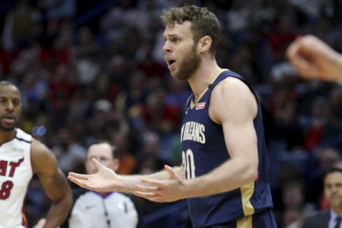 New Orleans Pelicans forward Nicolo Melli (20) questions a call in the second half of an NBA basketball game against the Miami Heat in New Orleans, Friday, March 6, 2020. (AP Photo/Rusty Costanza)