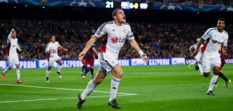 BARCELONA, SPAIN - SEPTEMBER 29:  Kyriakos Papadopoulos of Bayer 04 Leverkusen celebrates after scoring the opening goal during the UEFA Champions League Group E match between FC Barcelona and Bayern 04 Leverkusen at Camp Nou on September 29, 2015 in Barcelona, Spain.  (Photo by Alex Caparros/Getty Images)