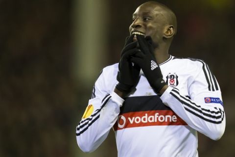 Besiktas' Demba Ba reacts after a missed opportunity during the Europa League Round of 32 soccer match between Liverpool and Besiktas at Anfield Stadium in Liverpool, England, Thursday, Feb. 19, 2015. (AP Photo/Jon Super)