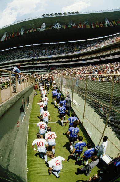 The players from Argentina and England walk onto the pitch during the 1986 FIFA World Cup Quarter Final on 22 June 1986 at the Azteca Stadium in Mexico City, Mexico. Argentina defeated England 2-1 in the infamous Hand of God game. (Photo by Michael King/Getty Images)
