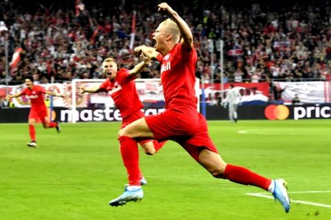 FC Red Bull Salzburg Erling Braut Haland celebrates after scoring against KRC Genk during the Champions League Group E at Red Bull Arena in Salzburg, Austria, Tuesday, Sept. 17, 2019. (AP Photo/Kerstin Joensson)