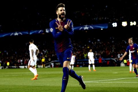 Barcelona's Gerard Pique celebrates after scoring the third goal of his team during a Champions League quarter-final, first leg soccer match between FC Barcelona and Roma at the Camp Nou stadium in Barcelona, Spain, Wednesday, April 4, 2018.(AP Photo/ Manu Fernandez)