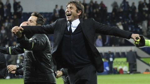 Chelsea's manager Antonio Conte celebrates with players after the English Premier League soccer match between West Bromwich Albion and Chelsea, at the Hawthorns in West Bromwich, England, Friday, May 12, 2017. Chelsea won the match 0-1 meaning they win the Premiership title. (AP Photo/Rui Vieira)