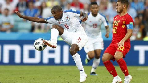 Panama's Armando Cooper, left, and Belgium's Eden Hazard challenge for the ball during the group G match between Belgium and Panama at the 2018 soccer World Cup in the Fisht Stadium in Sochi, Russia, Monday, June 18, 2018. (AP Photo/Matthias Schrader)