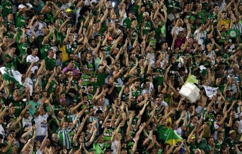 FILE PHOTO - Soccer fans of Chapecoense celebrate after their victory in the Copa Sudamericana match against San Lorenzo at the Arena Conda stadium in Chapeco, Brazil, November 23, 2016. An aircraft with 81 people aboard, including Brazilian football team Chapecoense, crashed in central Colombia, the country's civil aviation association said on its website on November 29, 2016. REUTERS/Paulo Whitaker/File Photo