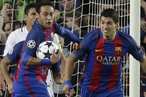 Barcelona's Neymar, left and his teammate Luis Suarez celebrates after PSG's Layvin Kurzawa scored an own goal during the Champions League round of 16, second leg soccer match between FC Barcelona and Paris Saint Germain at the Camp Nou stadium in Barcelona, Spain, Wednesday March 8, 2017. (AP Photo/Emilio Morenatti)
