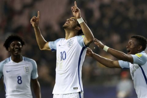 England's Dominic Solanke, center, celebrates his goal against Italy with teammates Ainsley Maitland-Niles, left, and Ademola Lookman during their semi final soccer match in the FIFA U-20 World Cup Korea 2017 at Jeonju World Cup Stadium in Jeonju, South Korea, Thursday, June 8, 2017. (AP Photo/Lee Jin-man)