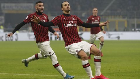 AC Milan's Zlatan Ibrahimovic celebrates after he scored his side's second goal during the Serie A soccer match between Inter Milan and AC Milan at the San Siro Stadium, in Milan, Italy, Sunday, Feb. 9, 2020. (AP Photo/Antonio Calanni)