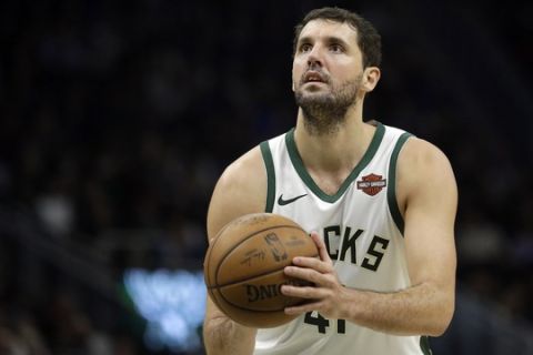 Milwaukee Bucks' Nikola Mirotic shoots a free throw during the second half of an NBA basketball game against the Charlotte Hornets Saturday, March 9, 2019, in Milwaukee. (AP Photo/Aaron Gash)