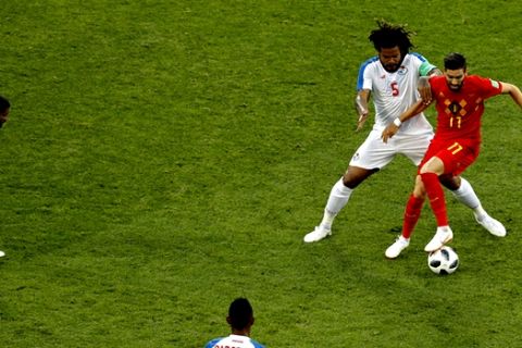 Belgium's Yannick Carrasco, right, vies for the ball with Panama's Roman Torres during the group G match between Belgium and Panama at the 2018 soccer World Cup in the Fisht Stadium in Sochi, Russia, Monday, June 18, 2018. (AP Photo/Victor R. Caivano)