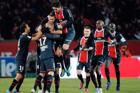 Paris Saint-Germain's Alex Rodrigo Dias Da Costa (C) celebrates with teammates after scoring a goal  during the French L1 football match PSG vs Montpellier on February 19,  2012 at the Parc des Princes stadium in Paris . AFP PHOTO / BERTRAND GUAY (Photo credit should read BERTRAND GUAY/AFP/Getty Images)