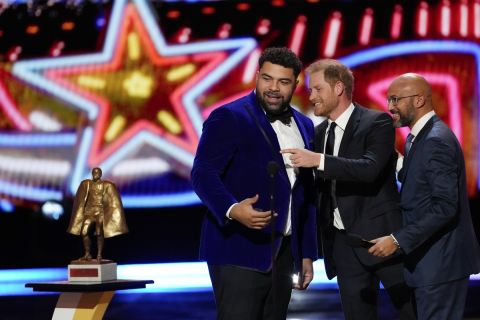Britain's Prince Harry, middle, presenter of the Walter Payton Man of the Year Award talks to winner Pittsburgh Steelers' Cameron Heyward, left, as Keegan-Michael Key looks on during the NFL Honors award show ahead of the Super Bowl 58 football game Thursday, Feb. 8, 2024, in Las Vegas. The San Francisco 49ers face the Kansas City Chiefs in Super Bowl 58 on Sunday. (AP Photo/David J. Phillip)