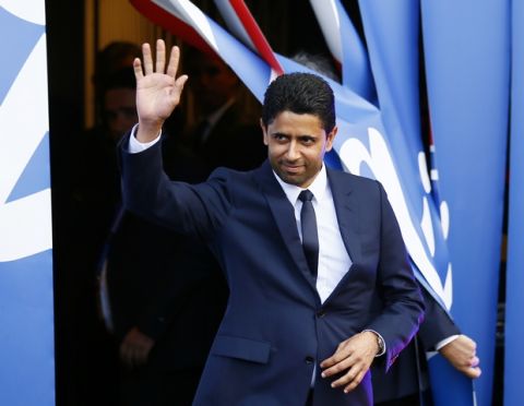 PSG president Nasser Ghanim Al-Khelaïfi arrives to welcome Brazilian soccer star Neymar at the Parc des Princes stadium in Paris, Saturday, Aug. 5, 2017, during his official presentation to fans ahead of Paris Saint-Germain's season opening match against Amiens. Neymar would not play in the club's season opener as the French football league did not receive the player's international transfer certificate before Friday's night deadline. The Brazil star became the most expensive player in soccer history after completing his blockbuster transfer from Barcelona for 222 million euros ($262 million) on Thursday. (AP Photo/Francois Mori)