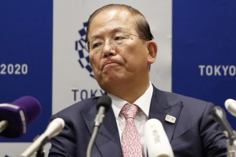 Tokyo 2020 Organizing Committee CEO Toshiro Muto attends a news conference after a Tokyo 2020 Executive Board Meeting in Tokyo Monday, March 30, 2020. Tokyo Olympic President Yoshiro Mori said Monday he expects to talk with IOC President Thomas Bach this week about potential dates and other details for the rescheduled games next year. Both Mori and Muto said the the cost of rescheduling will be massive - local reports suggest several billion dollars - with most of the expenses borne by Japanese taxpayers. (Issei Kato/Pool Photo via AP)