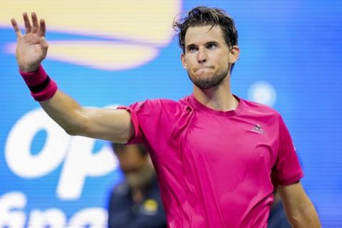 Dominic Thiem, of Austria, reacts after defeating Alexander Zverev, of Germany, in the men's singles final of the US Open tennis championships, Sunday, Sept. 13, 2020, in New York. (AP Photo/Frank Franklin II)