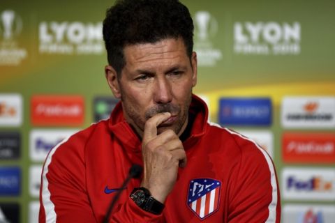 Atletico de Madrid head coach Diego Simeone, reacts during a press conference in Lyon, central France, Tuesday May, 15, 2018 ahead of the the UEFA Europa League Final against Olympique Marseille. (UEFA, Pool via AP)