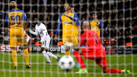 Tottenham's Georges-Kevin N'koudou, second left, celebrates as scores the third goal against APOEL during the Champions League Group H soccer match between Tottenham and APOEL Nicosia in London, Wednesday, Dec. 6, 2017. (AP Photo/Frank Augstein)