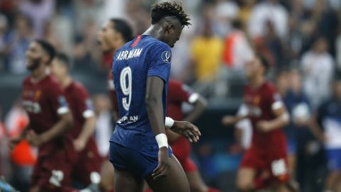 Chelsea's Tammy Abraham walks away after having his penalty saved in a shootout during the UEFA Super Cup soccer match between Liverpool and Chelsea, in Besiktas Park, in Istanbul, Thursday, Aug. 15, 2019. Liverpool won 5-4 in a penalty shootout after the game ended tied 2-2. (AP Photo/Emrah Gurel)