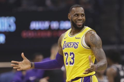 Los Angeles Lakers forward LeBron James gestures during the second half of an NBA basketball game against the Sacramento Kings, Saturday, Nov. 10, 2018, in Sacramento, Calif. The Lakers won 101-86. (AP Photo/Rich Pedroncelli)