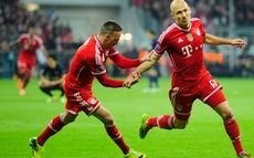 MUNICH, GERMANY - APRIL 09:  Arjen Robben (R) and Franck Ribery of Muenchen celebrate their third goal during the UEFA Champions League quarter-final second leg match between FC Bayern Muenchen and Manchester United at Allianz Arena on April 9, 2014 in Munich, Germany.  (Photo by Lennart Preiss/Bongarts/Getty Images)