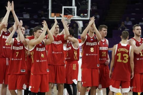 Players of Russia greet spectators after loosing to Spain during their Eurobasket European Basketball Championship bronze medal match in Istanbul, Sunday, Sept. 17. 2017. (AP Photo/Thanassis Stavrakis)