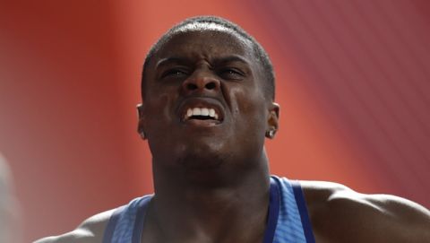 Christian Coleman of the United States gestures after a men's 100 meters heats at the World Athletics Championships in Doha, Qatar, Friday, Sept. 27, 2019. (AP Photo/Petr David Josek)