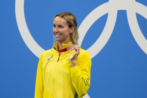 Emma Mckeon, of Australia, poses after winning the gold medal in the women's 100-meter freestyle final at the 2020 Summer Olympics, Friday, July 30, 2021, in Tokyo, Japan. (AP Photo/Jae C. Hong)