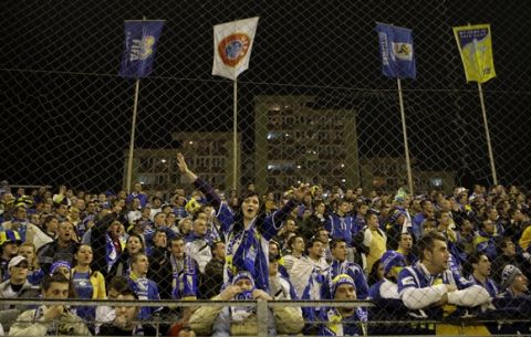 Bosnian supporters in the stands before their World Cup qualifying playoff second leg soccer match against Portugal Wednesday, Nov. 18 2009, at the Bilino Polje  stadium in Zenica, Bosnia. (AP Photo/Armando Franca)
