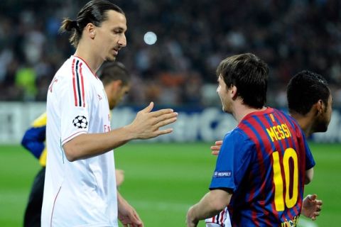 MILAN, ITALY - MARCH 28:  Zlatan Ibrahimovic of AC Milan and Lionel Messi of Barcelona during the UEFA Champions League quarter final first leg match between AC Milan and Barcelona at Stadio Giuseppe Meazza on March 28, 2012 in Milan, Italy.  (Photo by Claudio Villa/Getty Images)