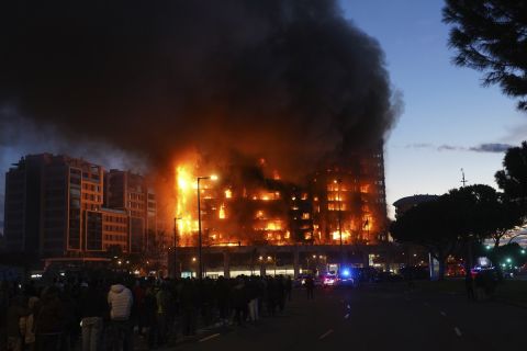 A housing block burns in Valencia, Spain, Thursday, Feb. 22, 2024. A fire engulfed two residential buildings in the eastern Spanish city of Valencia on Thursday, with reported injuries. (AP Photo/Alberto Saiz)