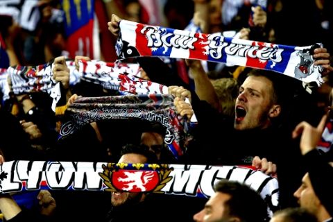 Lyon's fans celebrate during a Group E Europa League soccer match between Everton F.C. and Olympique Lyon at Goodison Park Stadium, Liverpool, England, Thursday Oct. 19, 2017. (AP Photo/Dave Thompson)
