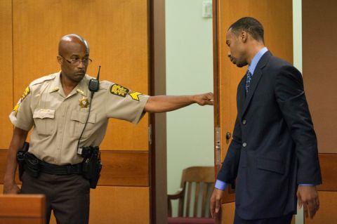 Former Washington Wizards guard Javaris Crittenton, right, exits a hearing on murder charges in the drive-by shooting of 22-year-old mother of four, Julian Jones, Tuesday, Sept. 27, 2011 in Fulton County Superior Court in Atlanta. (AP Photo/David Goldman, Pool)