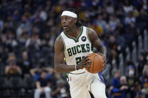 Milwaukee Bucks guard Jrue Holiday during an NBA basketball game against the Golden State Warriors in San Francisco, Saturday, March 12, 2022. (AP Photo/Jeff Chiu)
