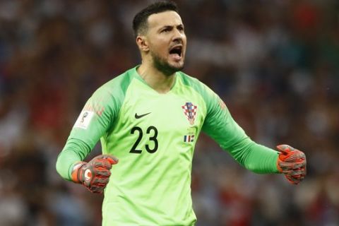 Croatia goalkeeper Danijel Subasic reacts after Croatia's Ivan Perisic scored his side's first goal during the final match between France and Croatia at the 2018 soccer World Cup in the Luzhniki Stadium in Moscow, Russia, Sunday, July 15, 2018. (AP Photo/Matthias Schrader)